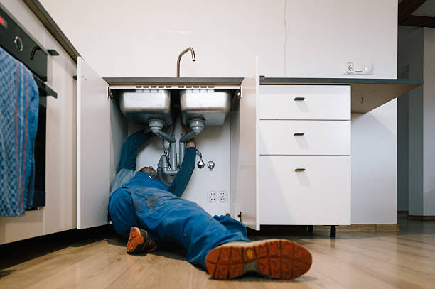 Professional Drain Cleaning technician working in Wells, MN